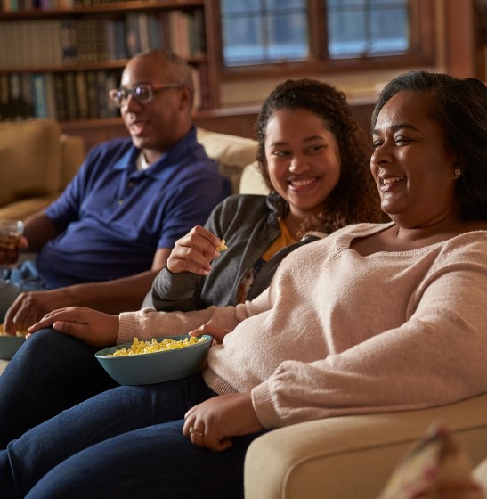 Family watching tv